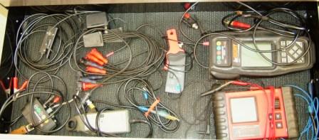 Shown to the right is a toolbox drawer containing some diagnostic tools.
